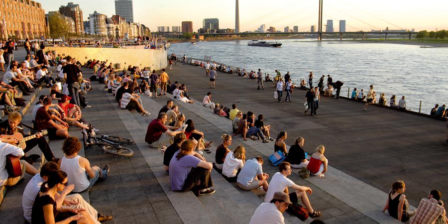 People sitting at the Rhine