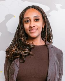 Photo of Celina Brook looking at the camera and smiling.